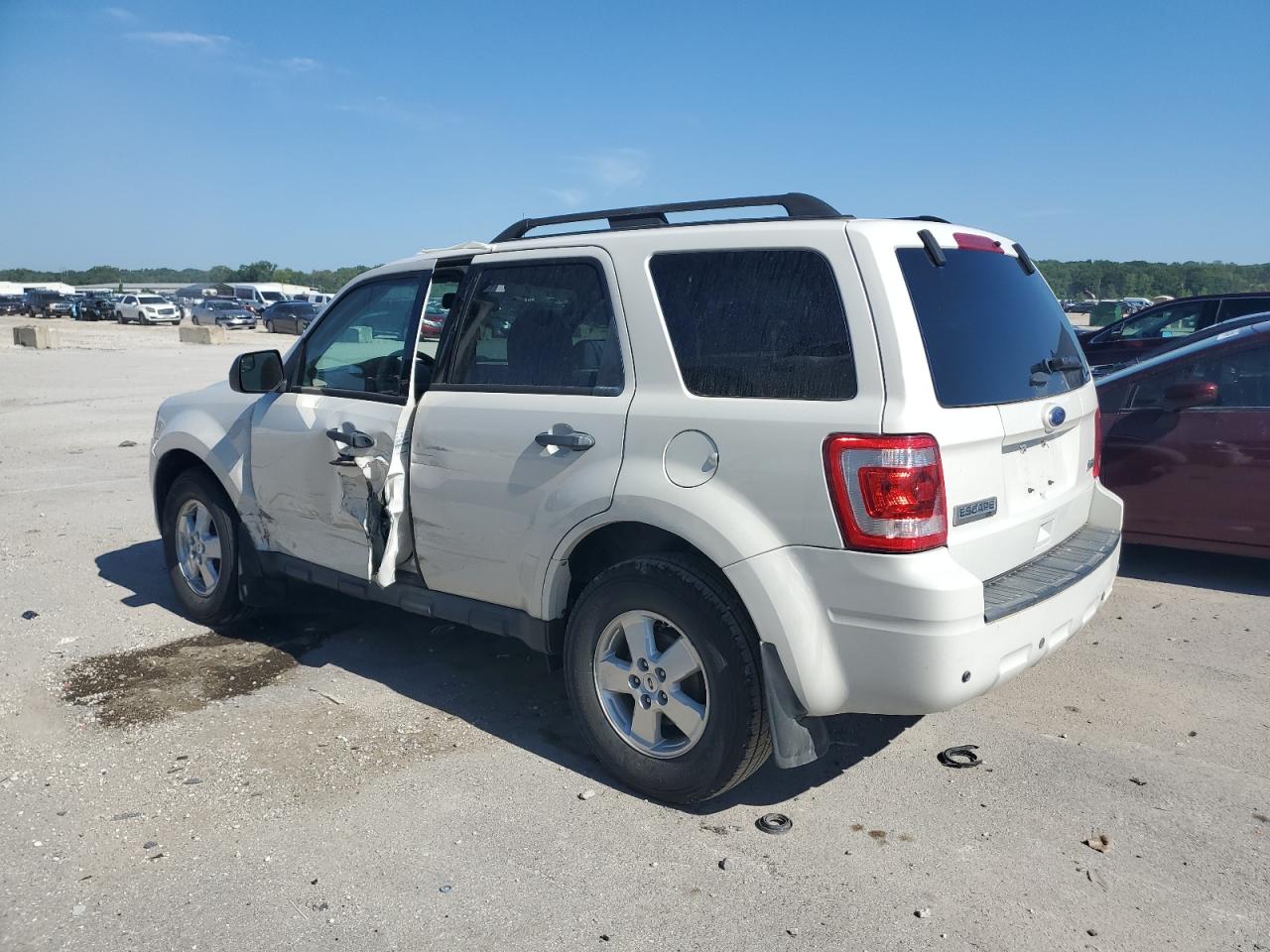 2012 Ford Escape VIN 1FMCU9DG1CKB68537 Copart auction photo, side damage thumbnail 2