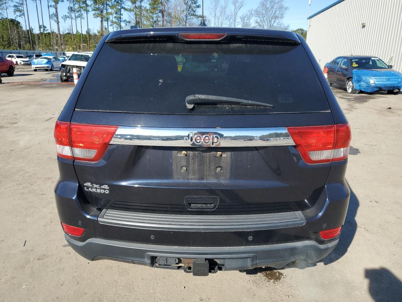 2011 Jeep Grand Cherokee VIN 1J4RR4GG9BC581405 Copart auction photo, front end damage thumbnail 6