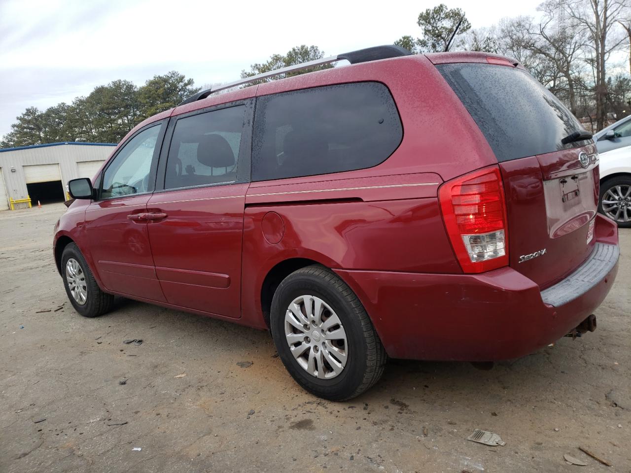 2011 KIA Sedona VIN KNDMG4C73B6405976 Copart auction photo, front end / minor dent/scratches damage thumbnail 2