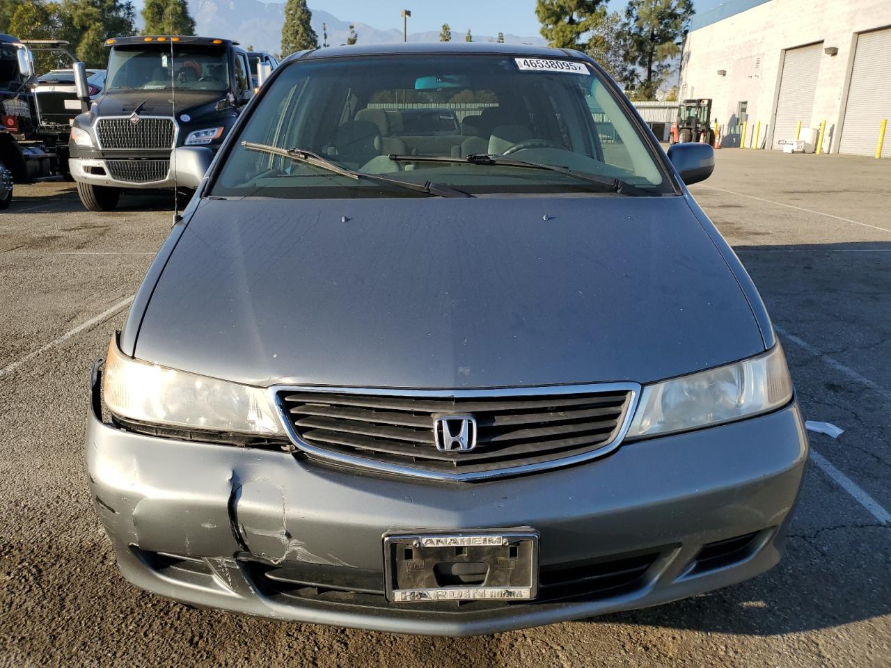 2000 Honda Odyssey VIN 2HKRL1871YH603608 Copart auction photo, all over damage thumbnail 5