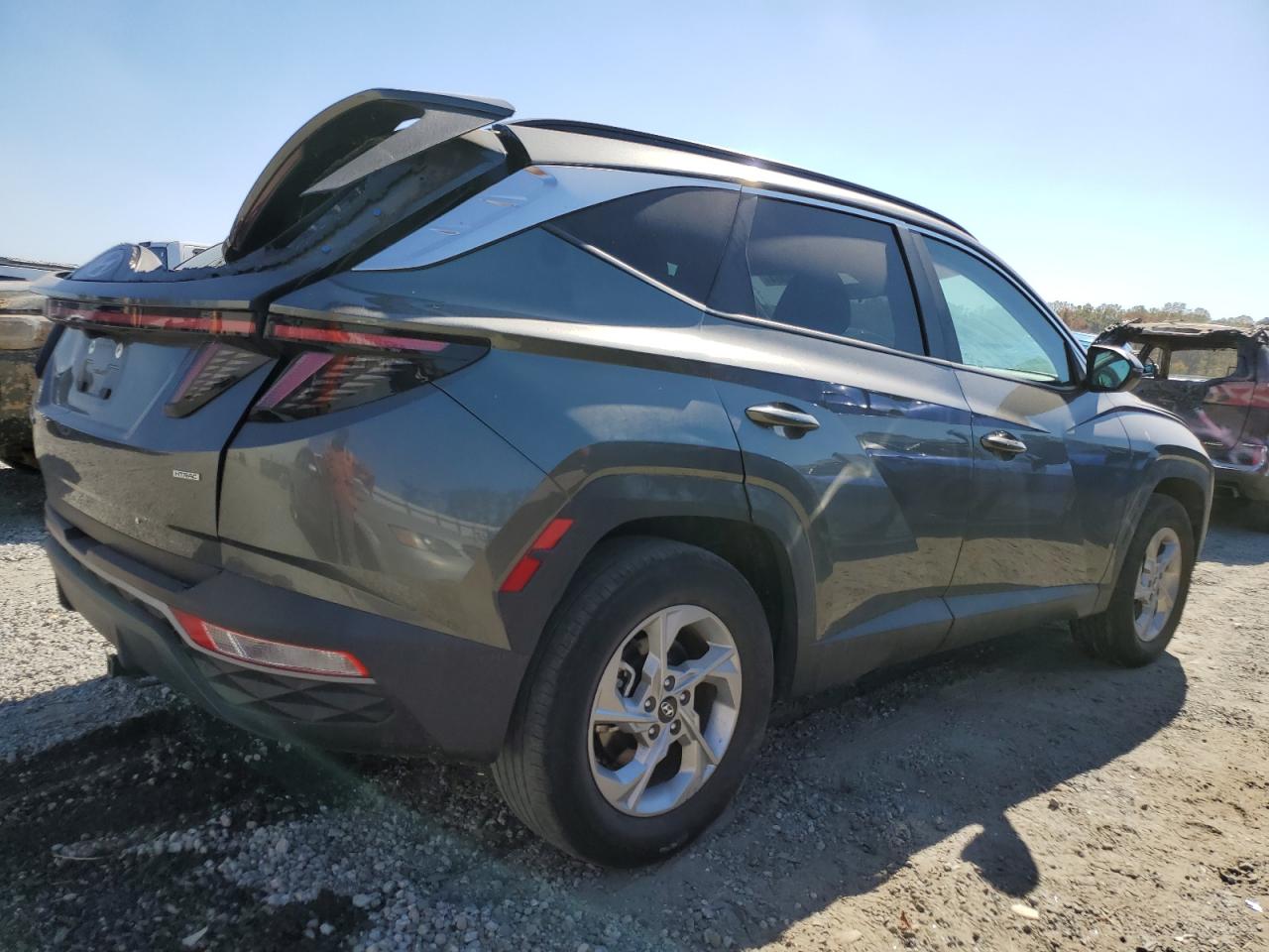 2022 Hyundai Tucson VIN 5NMJBCAEXNH121166 Copart auction photo, top/roof damage thumbnail 3