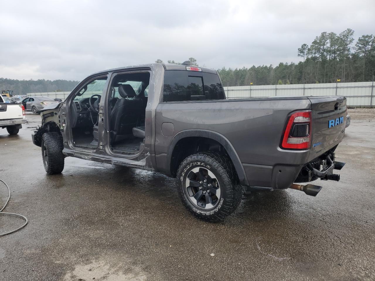 2021 RAM 1500 VIN 1C6SRFLTXMN760802 Copart auction photo, side / front end damage thumbnail 2