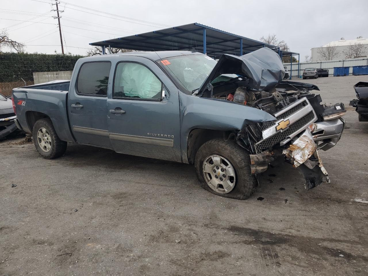 2012 Chevrolet Silverado VIN 3GCPKSE71CG100537 Copart auction photo, all over damage thumbnail 4