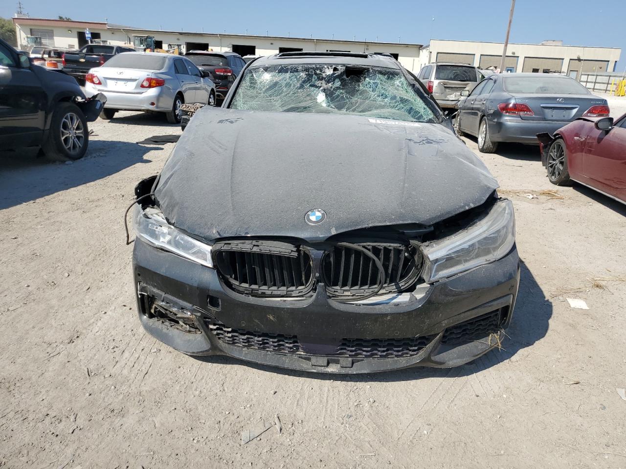 2017 BMW 7er VIN WBA7F2C56HG422466 Copart auction photo, rear end / front end damage thumbnail 5