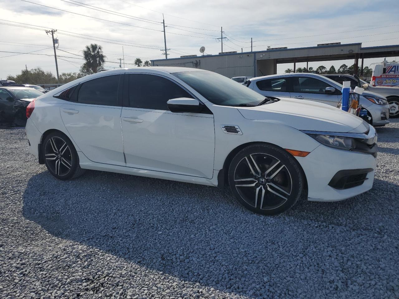 2017 Honda Civic VIN 19XFC2F51HE063739 Copart auction photo, minor dent/scratches damage thumbnail 4