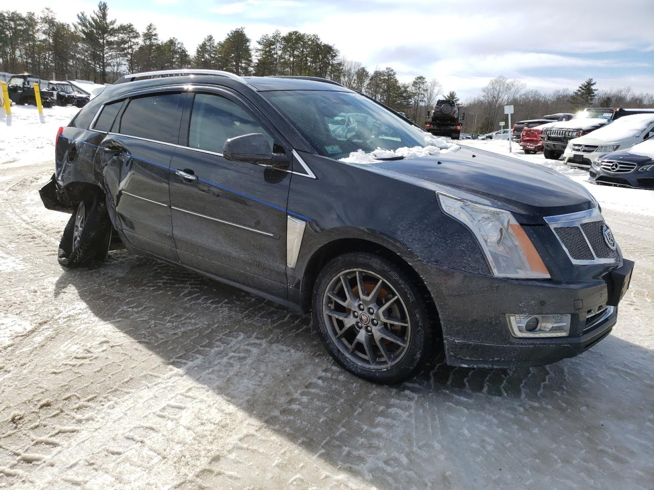 2016 Cadillac SRX VIN 3GYFNCE33GS530055 Copart auction photo, side / undercarriage damage thumbnail 4
