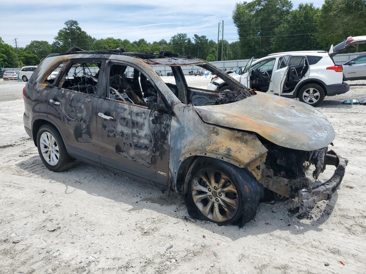 2014 KIA Sorento VIN 5XYKUDA7XEG497754 Copart auction photo, burn damage thumbnail 4