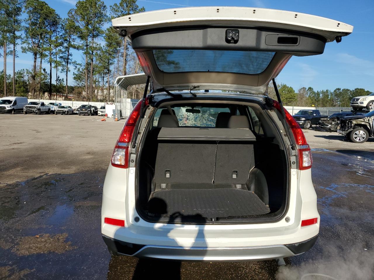 2015 Honda CR-V VIN 5J6RM4H5XFL119372 Copart auction photo, burn damage thumbnail 6