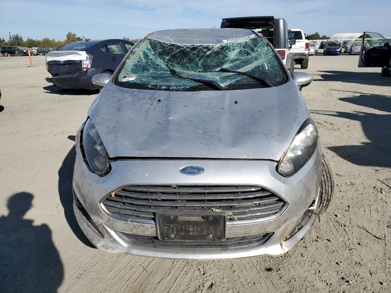 2014 Ford Fiesta VIN 3FADP4BJ4EM148611 Copart auction photo, all over damage thumbnail 4
