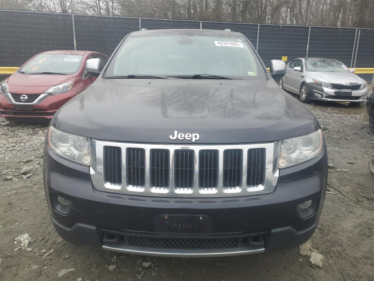 2011 Jeep Grand Cherokee VIN 1J4RR5GG3BC703309 Copart auction photo, minor dent/scratches damage thumbnail 5