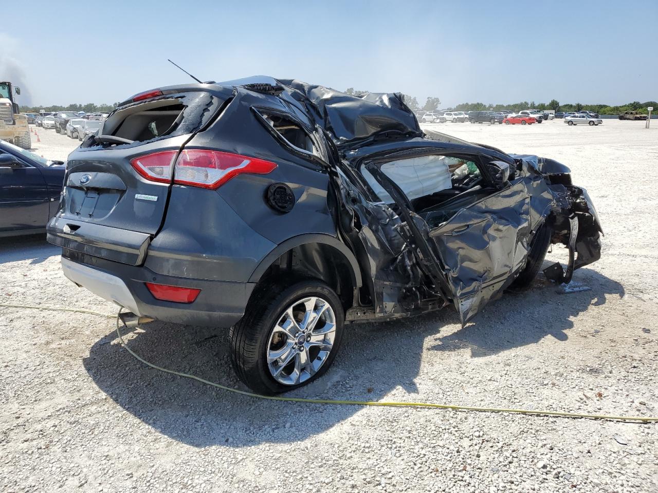 2015 Ford Escape VIN 1FMCU0GX8FUC32606 Copart auction photo, rollover damage thumbnail 3
