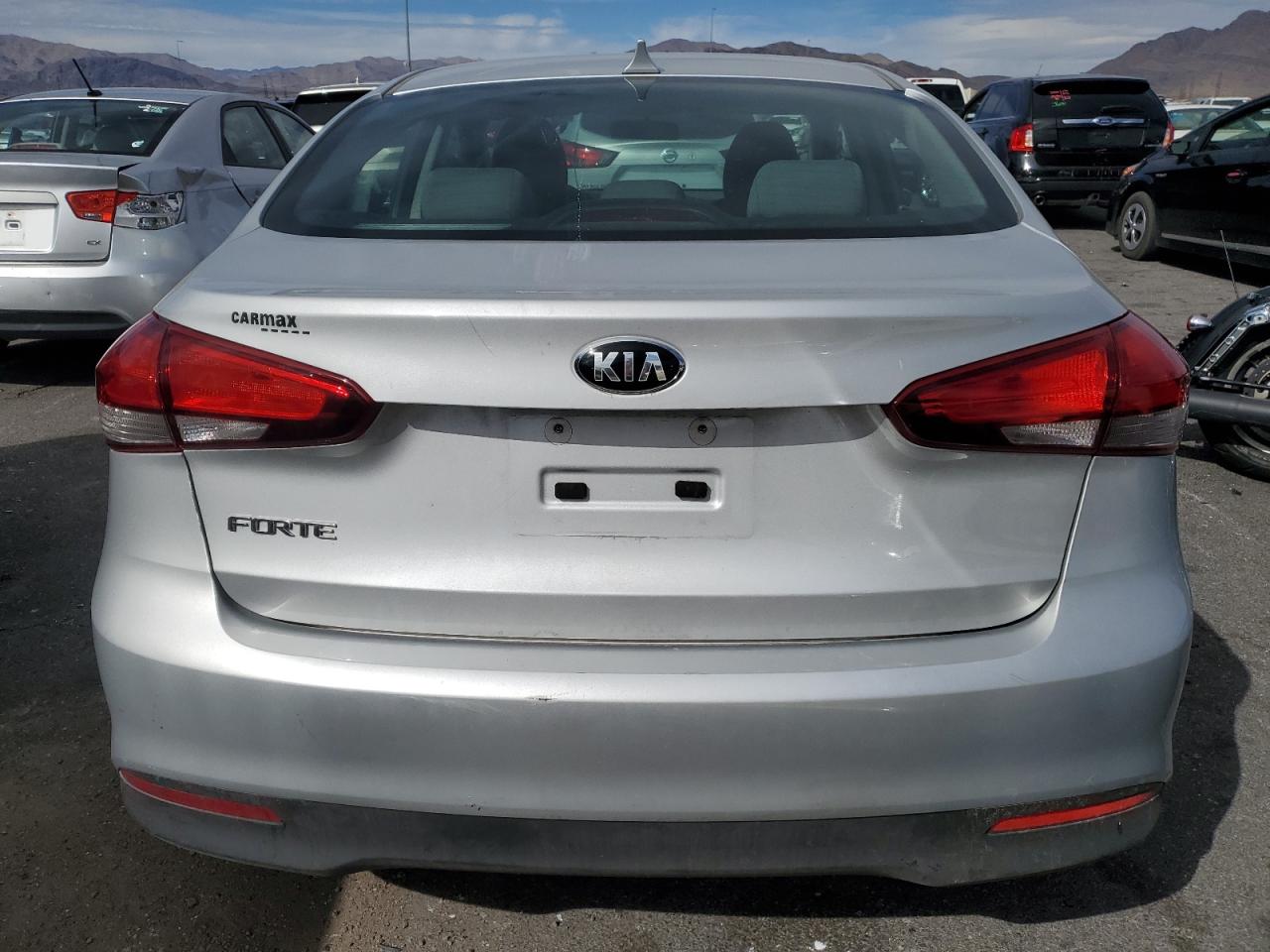2017 KIA Forte VIN 3KPFK4A77HE131713 Copart auction photo, vandalism damage thumbnail 6
