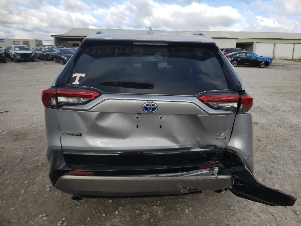 2022 Toyota RAV 4 VIN JTM16RFV0ND521990 Copart auction photo, all over damage thumbnail 6