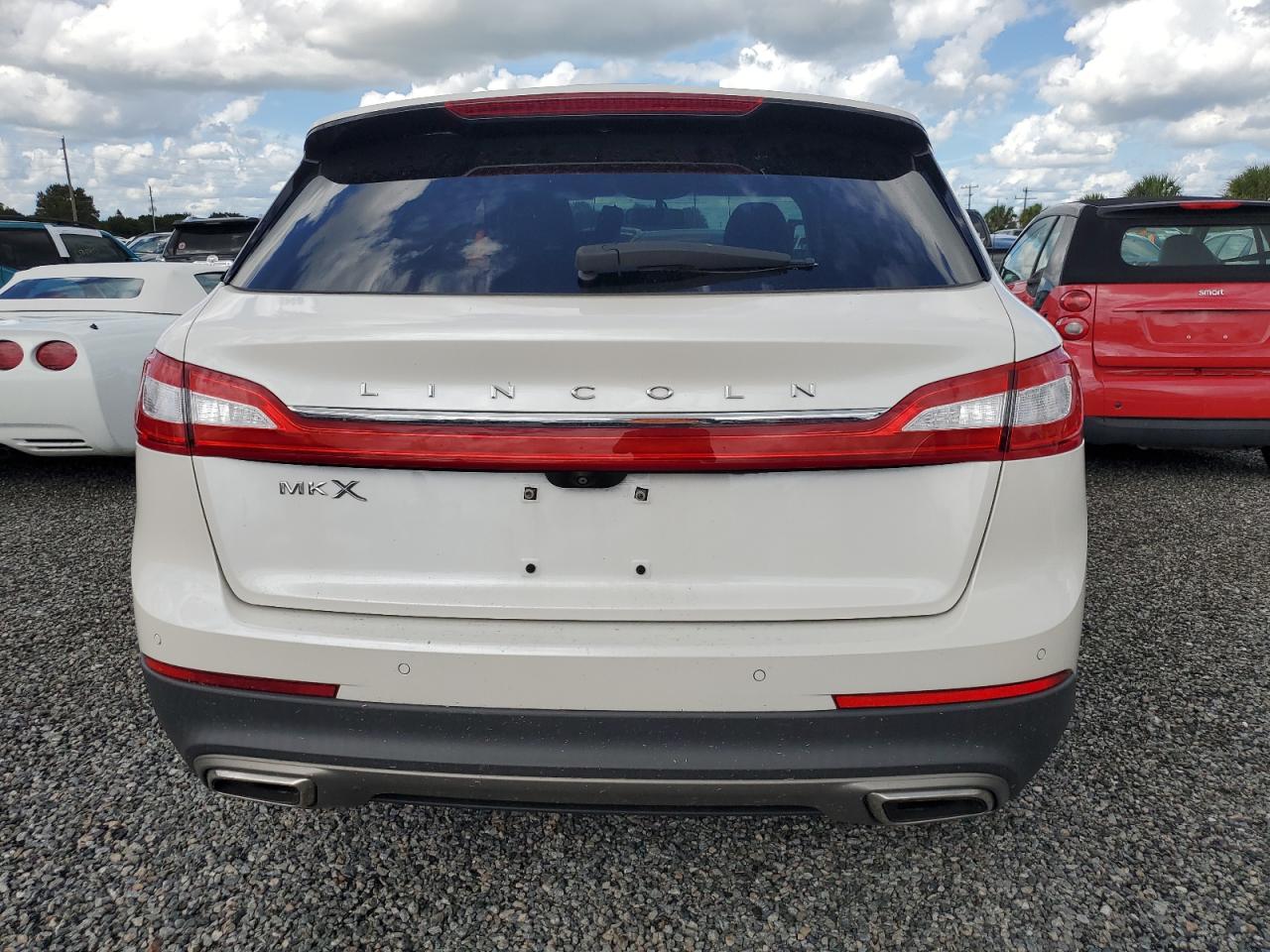 2016 Lincoln MKX VIN 2LMTJ6LRXGBL75815 Copart auction photo, water/flood damage thumbnail 6