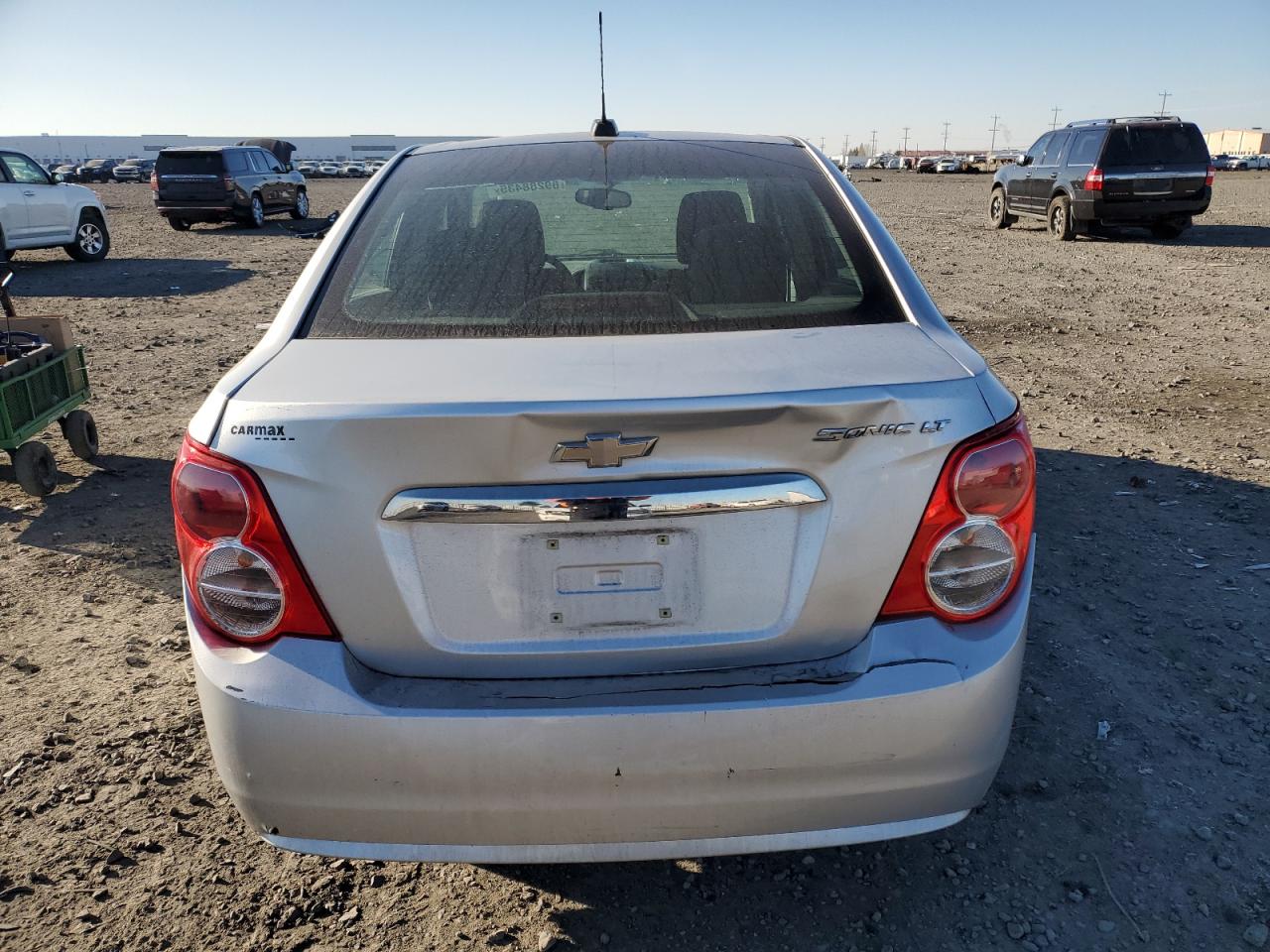 2015 Chevrolet Sonic VIN 1G1JC5SG1F4194714 Copart auction photo, rear end damage thumbnail 6