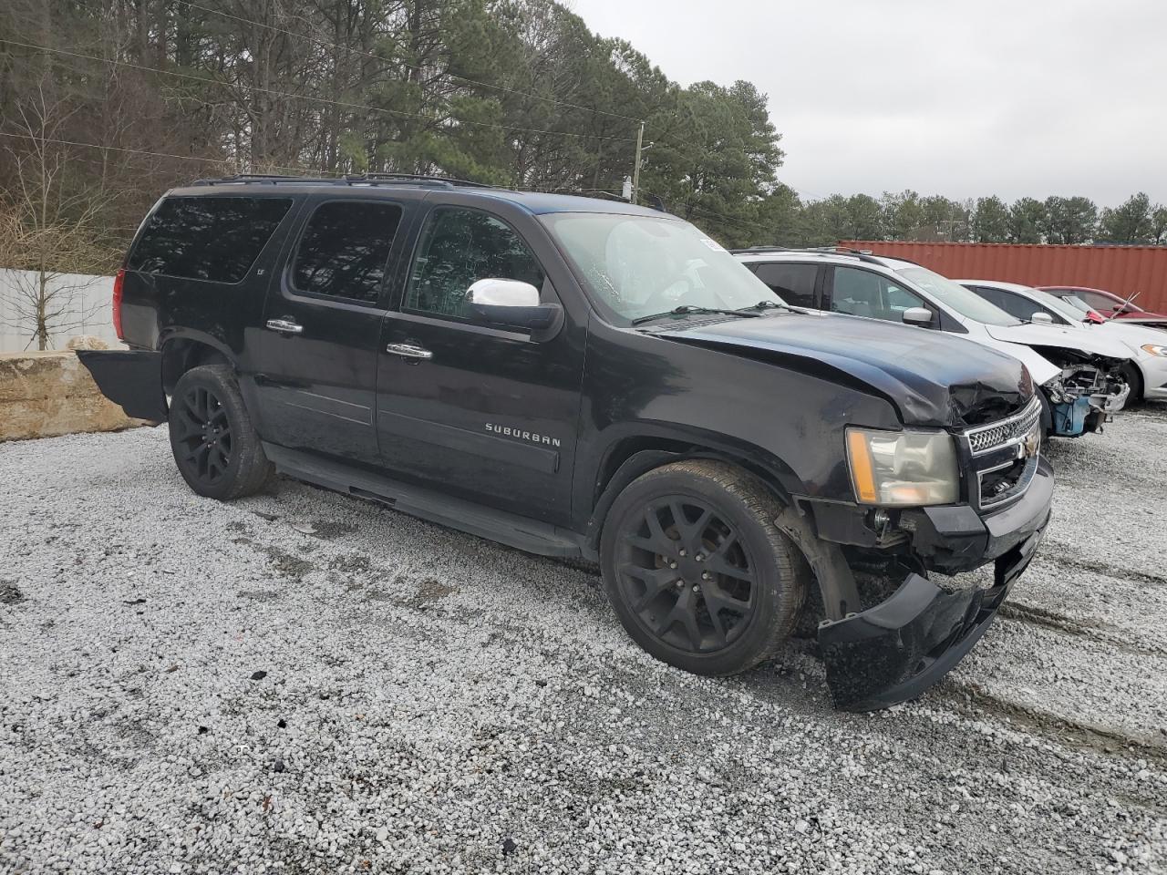 2010 Chevrolet Suburban VIN 1GNUCJE06AR228967 Copart auction photo, front end / rear end damage thumbnail 4