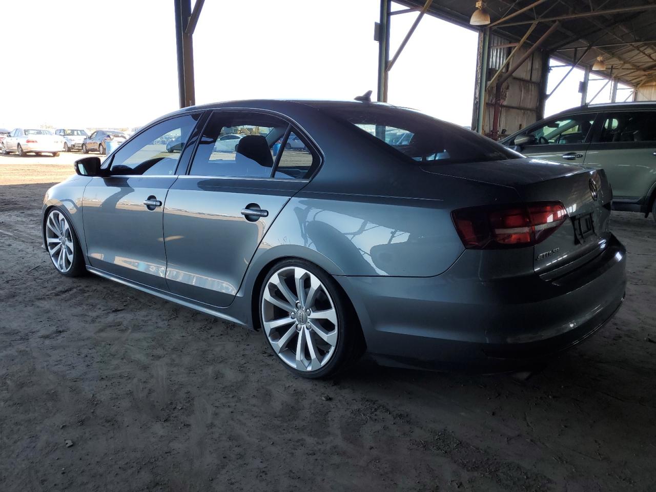 2016 Volkswagen Jetta VIN 3VWL07AJ9GM391120 Copart auction photo, side / rear end damage thumbnail 2