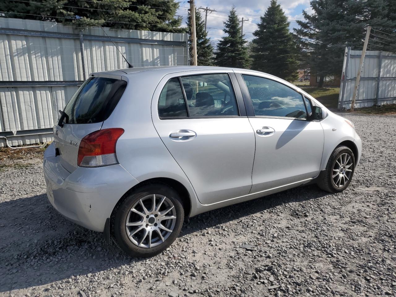 2009 Toyota Yaris VIN JTDKT923495273065 Copart auction photo, normal wear damage thumbnail 3