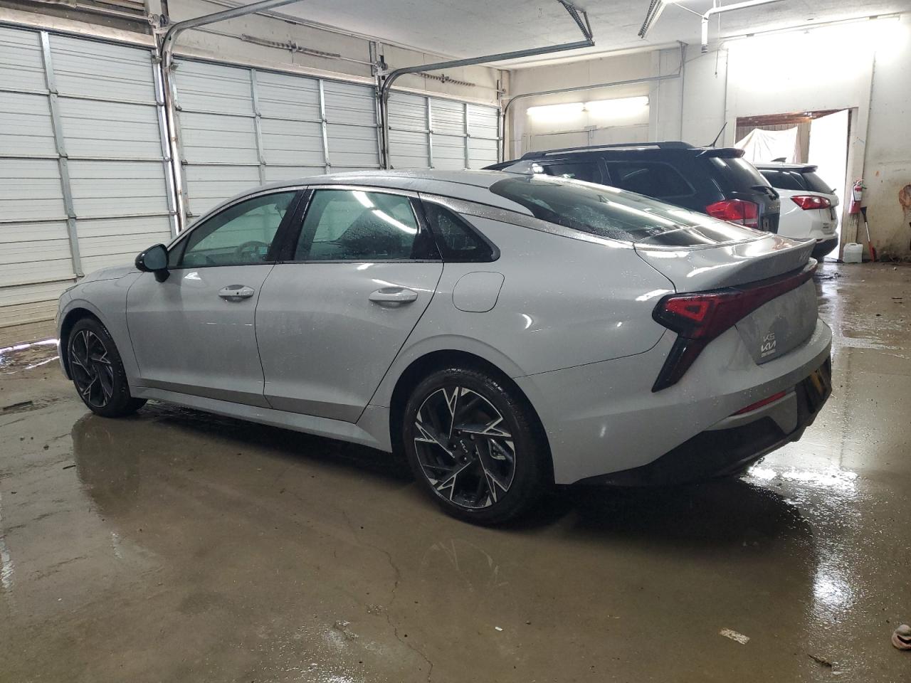 2025 KIA K5 VIN KNAG64J76S5312200 Copart auction photo, undercarriage / minor dent/scratches damage thumbnail 2