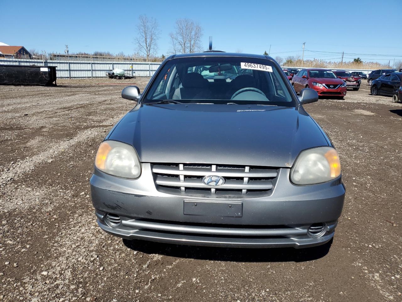 2005 Hyundai Accent VIN KMHCG35C65U331867 Copart auction photo, normal wear damage thumbnail 5