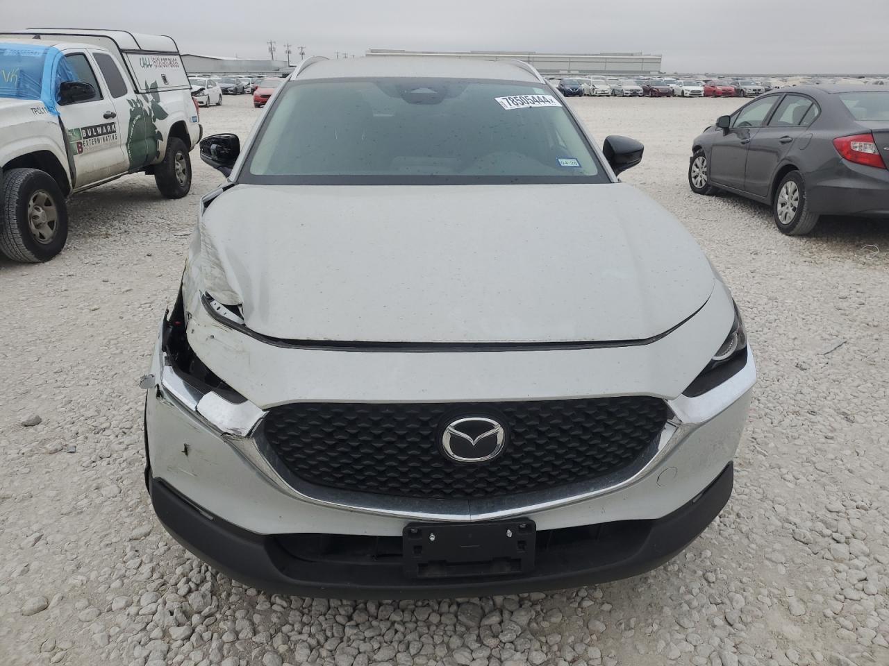 2024 Mazda CX-30 VIN 3MVDMBBM9RM673489 Copart auction photo, side / front end damage thumbnail 5