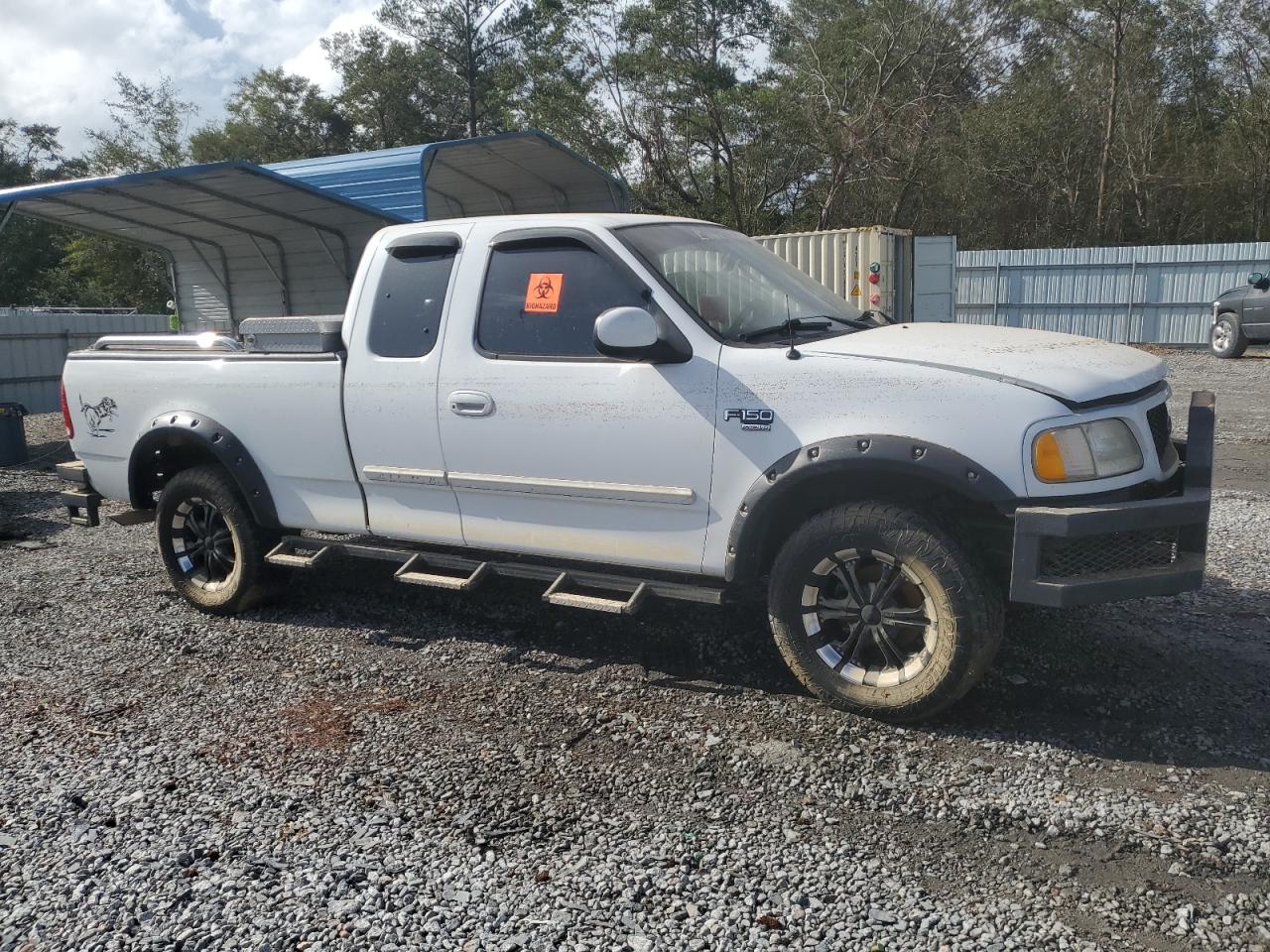 2003 Ford F-150 VIN 1FTRX18L63NB23817 Copart auction photo, water/flood damage thumbnail 4