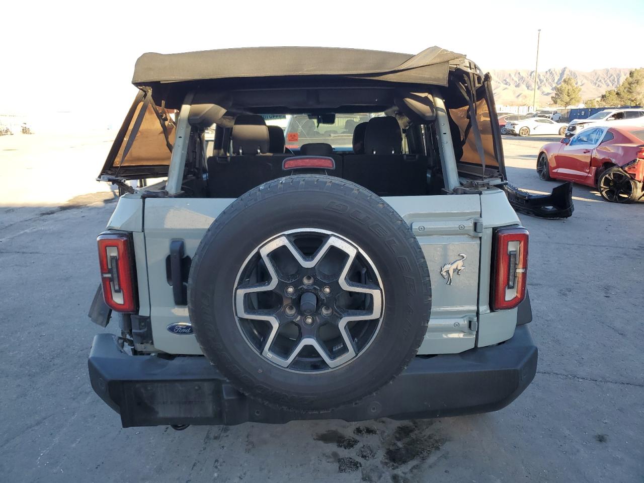 2022 Ford Bronco VIN 1FMDE5BH3NLA99823 Copart auction photo, all over damage thumbnail 6