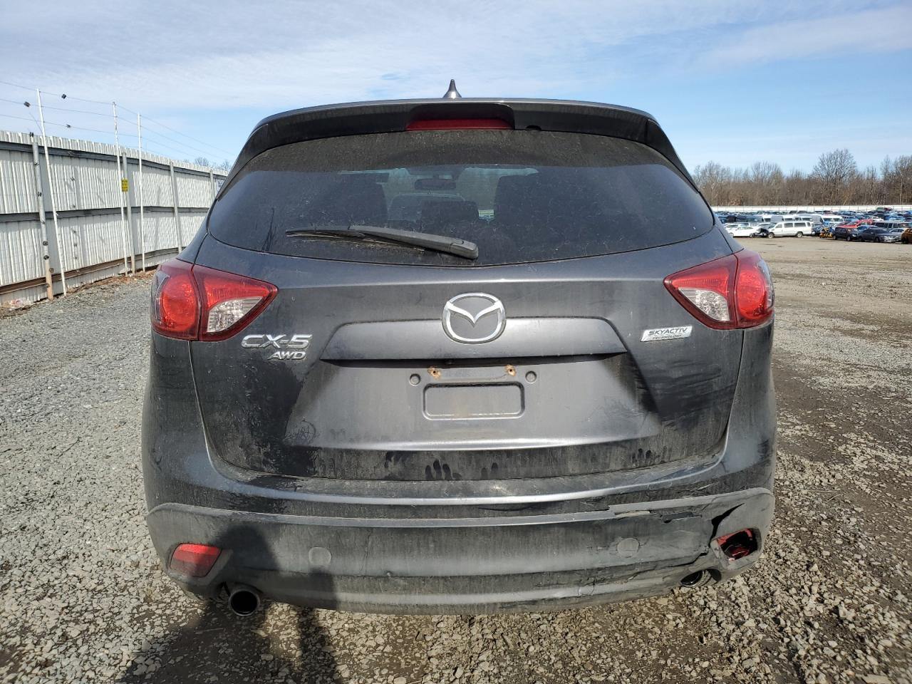 2016 Mazda CX-5 VIN JM3KE4DY5G0888974 Copart auction photo, side / rear end damage thumbnail 6