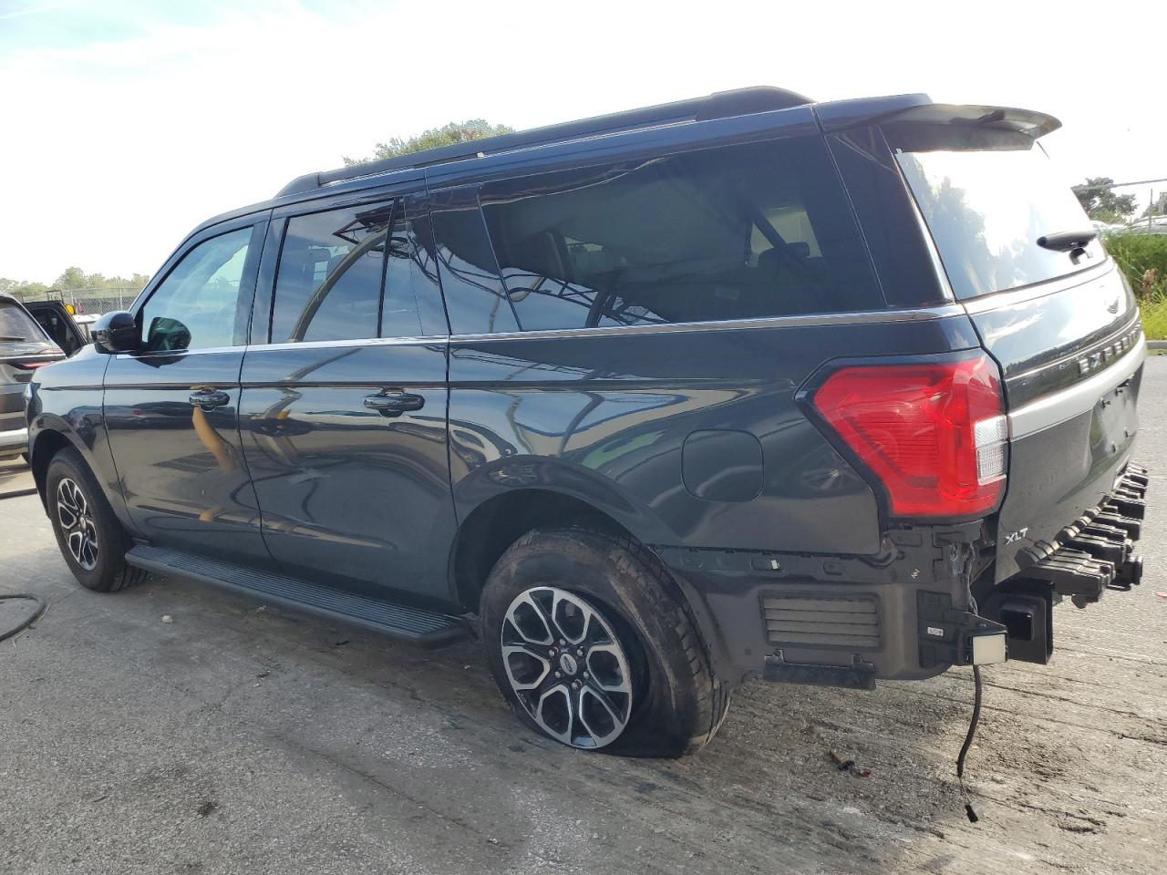 2023 Ford Expedition VIN 1FMJK1J89PEA16697 Copart auction photo, side / rear end damage thumbnail 2