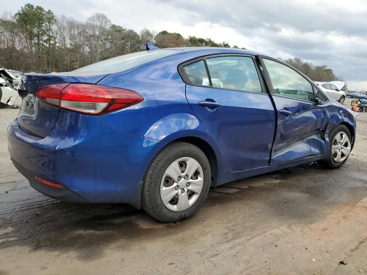 2017 KIA Forte VIN 3KPFK4A74HE149957 Copart auction photo, side / front end damage thumbnail 3