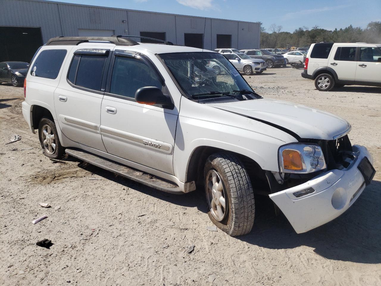 2003 GMC Envoy VIN 1GKET16SX36234308 Copart auction photo, all over damage thumbnail 4