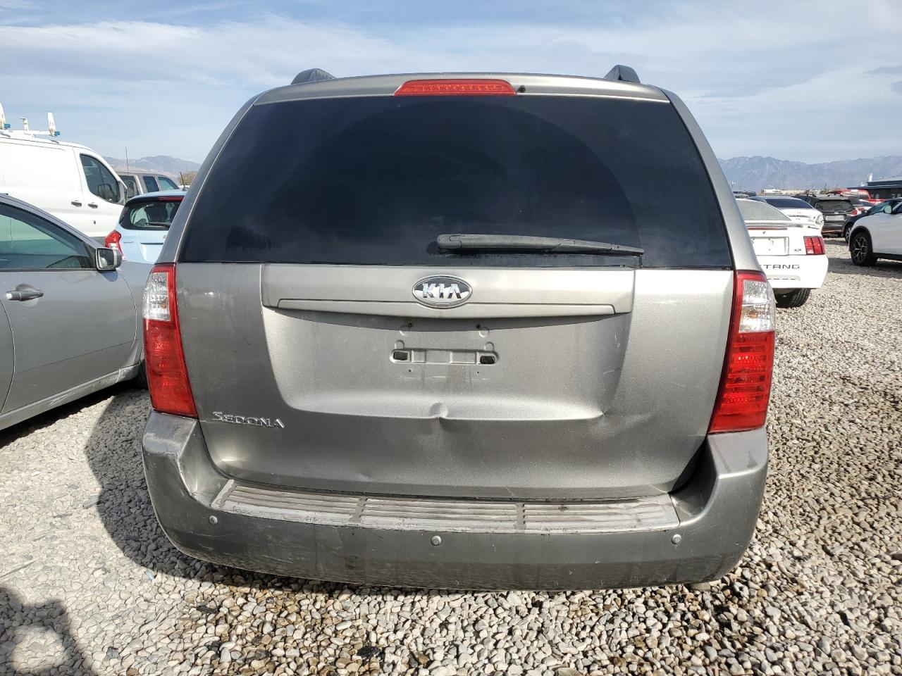 2010 KIA Sedona VIN KNDMG4C33A6339599 Copart auction photo, front end damage thumbnail 6