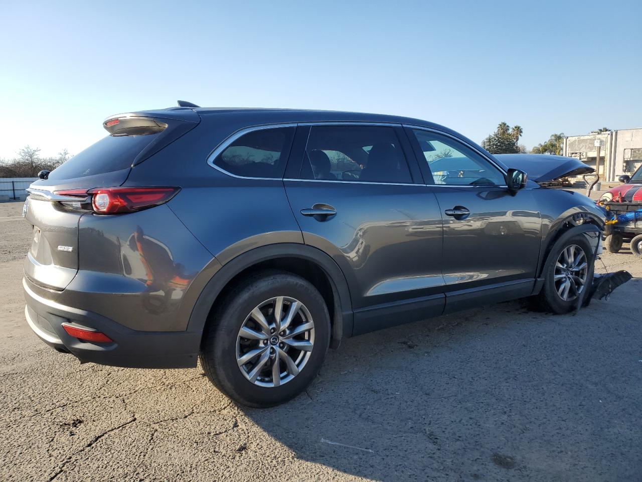 2019 Mazda CX-9 VIN JM3TCACY1K0306940 Copart auction photo, front end / side damage thumbnail 3