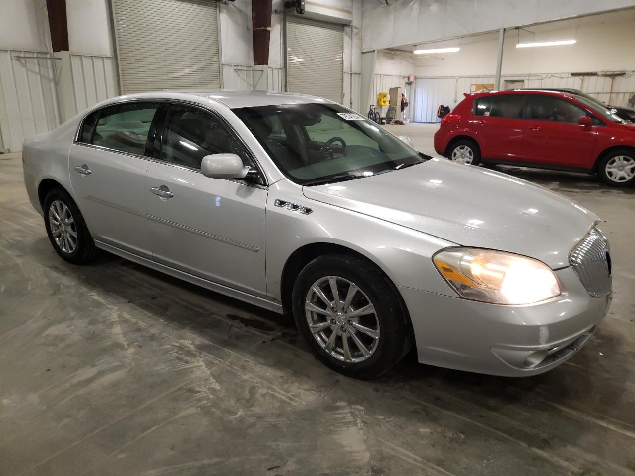 2011 Buick Lucerne VIN 1G4HJ5EMXBU114104 Copart auction photo, front end / all over damage thumbnail 4