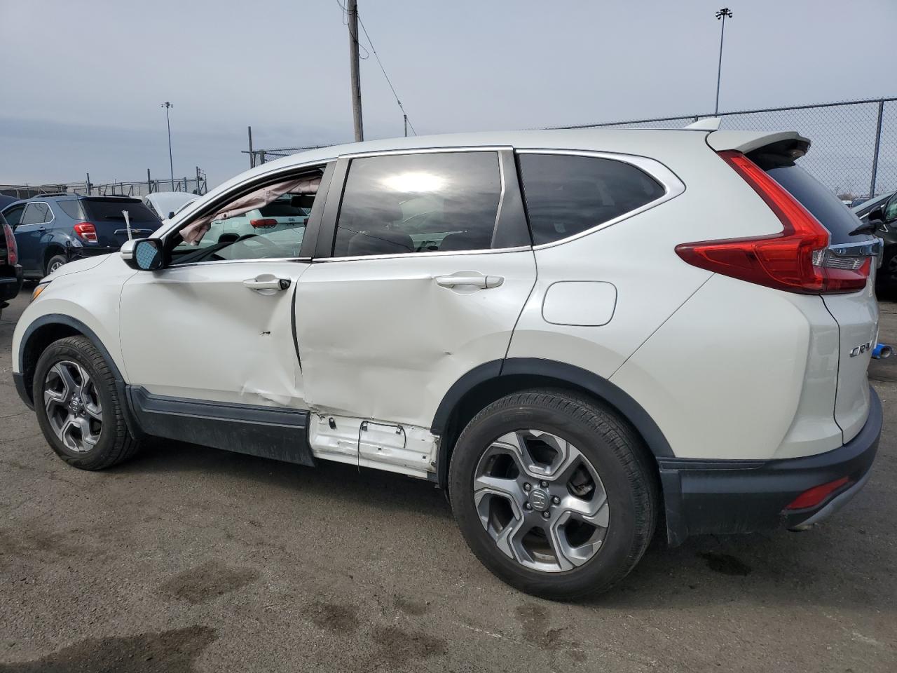 2018 Honda CR-V VIN 2HKRW2H52JH610004 Copart auction photo, side damage thumbnail 2