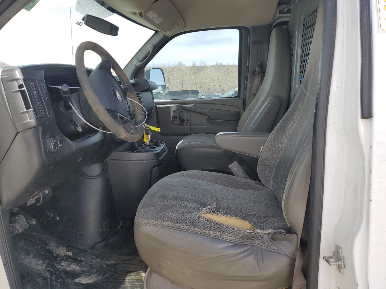 2015 Chevrolet Express VIN 1GCWGFCG3F1196195 Copart auction photo, front end / hail damage thumbnail 7