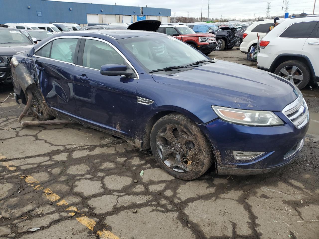 2011 Ford Taurus VIN 1FAHP2KT6BG165231 Copart auction photo, front end / side damage thumbnail 4