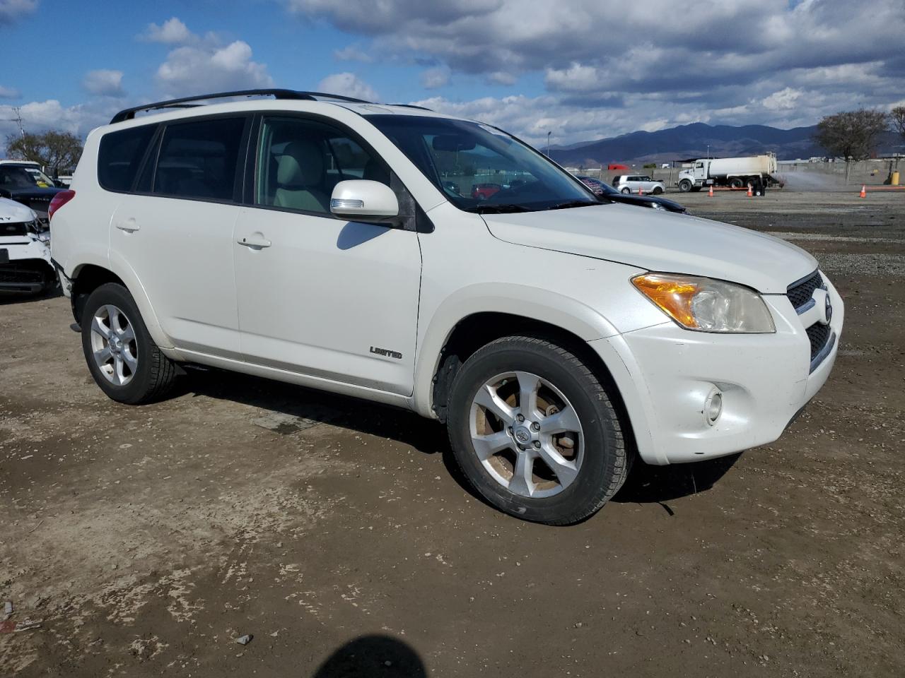 2009 Toyota RAV 4 VIN JTMZK31V795025622 Copart auction photo, rear end damage thumbnail 4