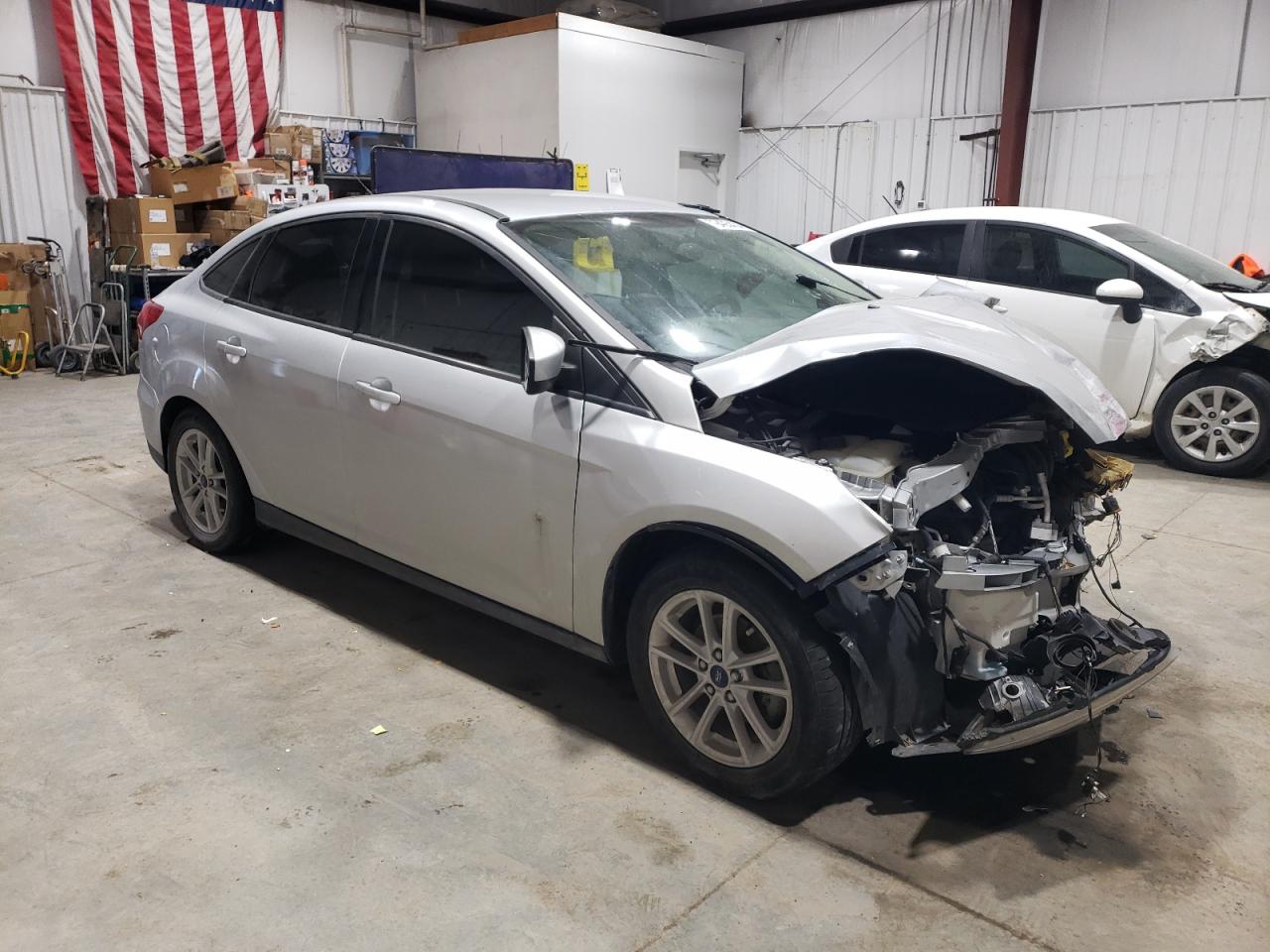 2018 Ford Focus VIN 1FADP3F24JL210825 Copart auction photo, all over damage thumbnail 4