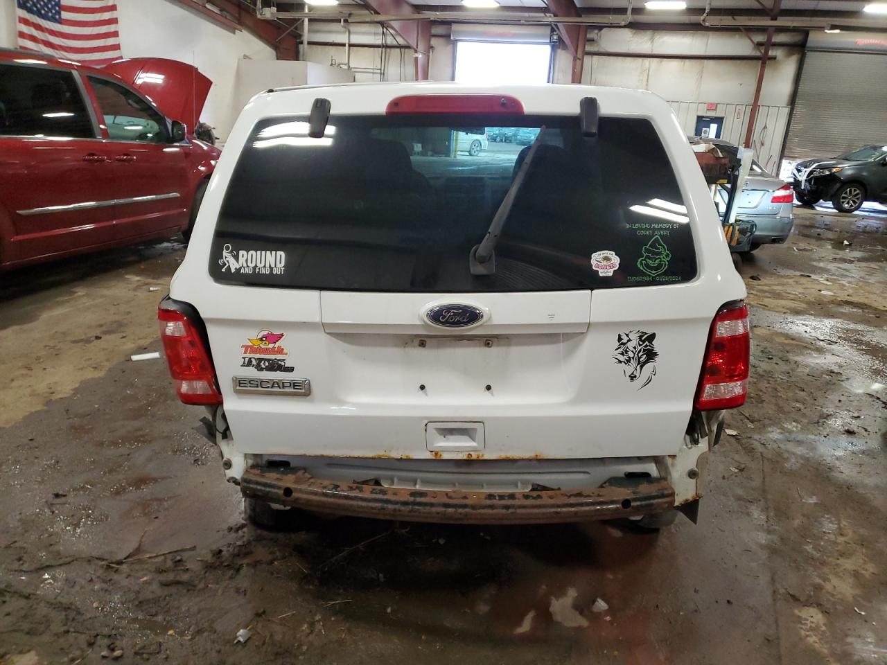 2010 Ford Escape VIN 1FMCU0C77AKB41031 Copart auction photo, side / rear end damage thumbnail 6