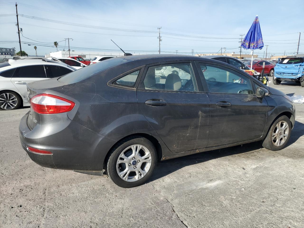 2015 Ford Fiesta VIN 3FADP4BJ8FM133546 Copart auction photo, minor dent/scratches / damage history damage thumbnail 3
