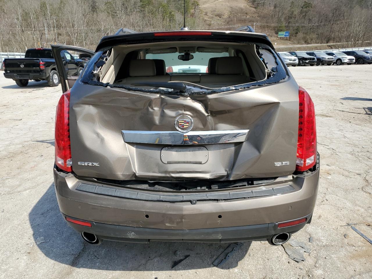 2015 Cadillac SRX VIN 3GYFNBE37FS637330 Copart auction photo, rear end damage thumbnail 6