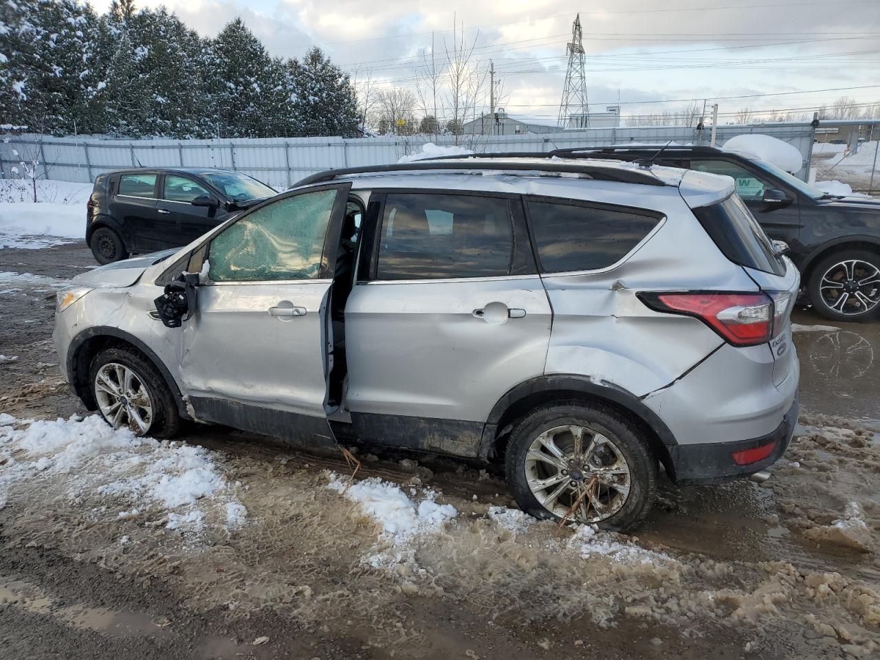 2017 Ford Escape VIN 1FMCU9G99HUE81585 Copart auction photo, front end / side damage thumbnail 2