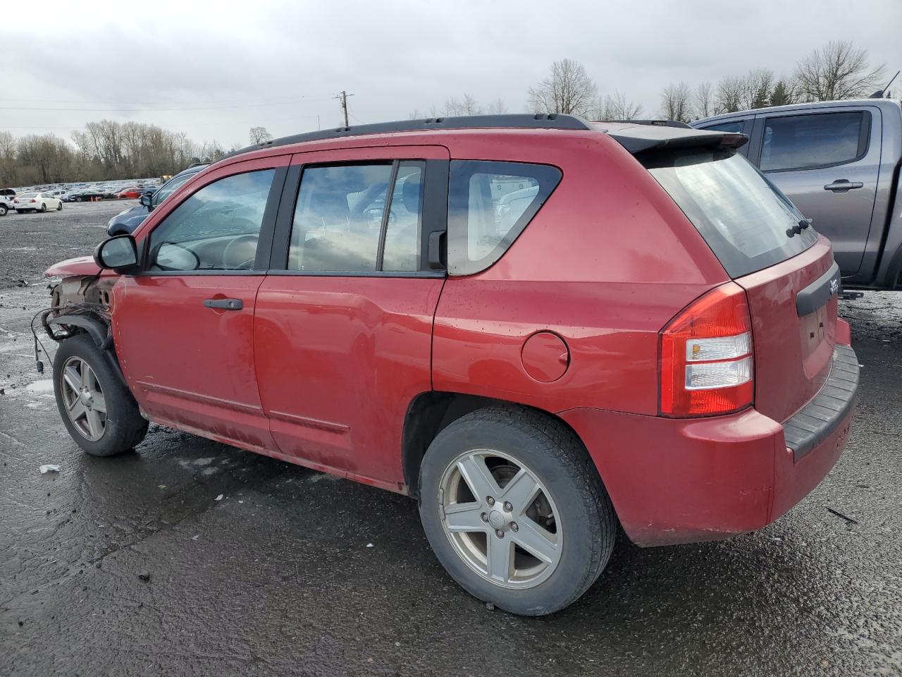 2010 Jeep Compass VIN 1J4NF4FB6AD511219 Copart auction photo, front end / undercarriage damage thumbnail 2