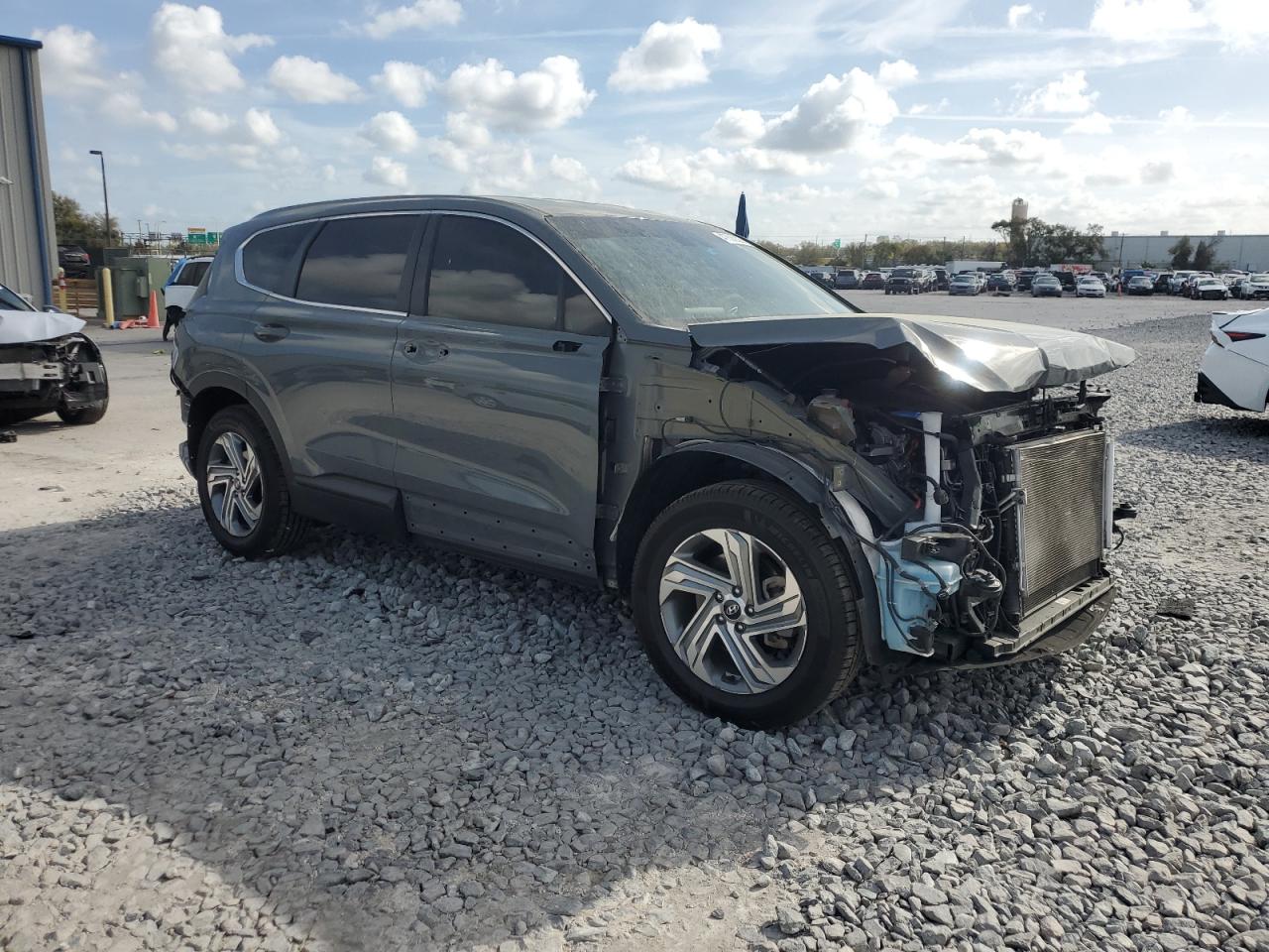 2023 Hyundai Santa Fe VIN 5NMS14AJ3PH499794 Copart auction photo, front end / rear end damage thumbnail 4