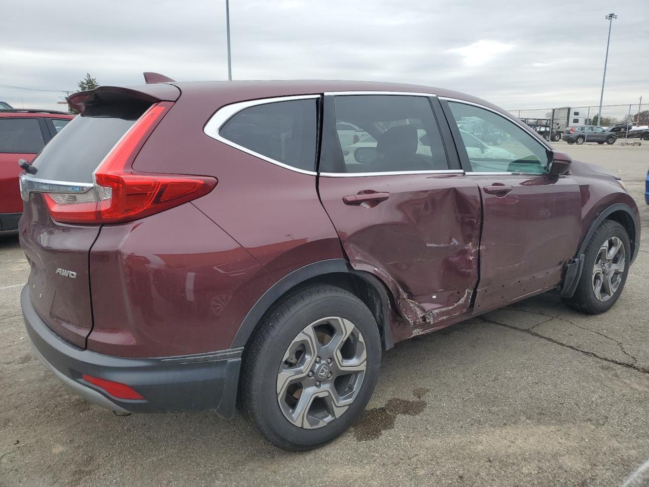 2019 Honda CR-V VIN 2HKRW2H52KH662895 Copart auction photo, side / front end damage thumbnail 3