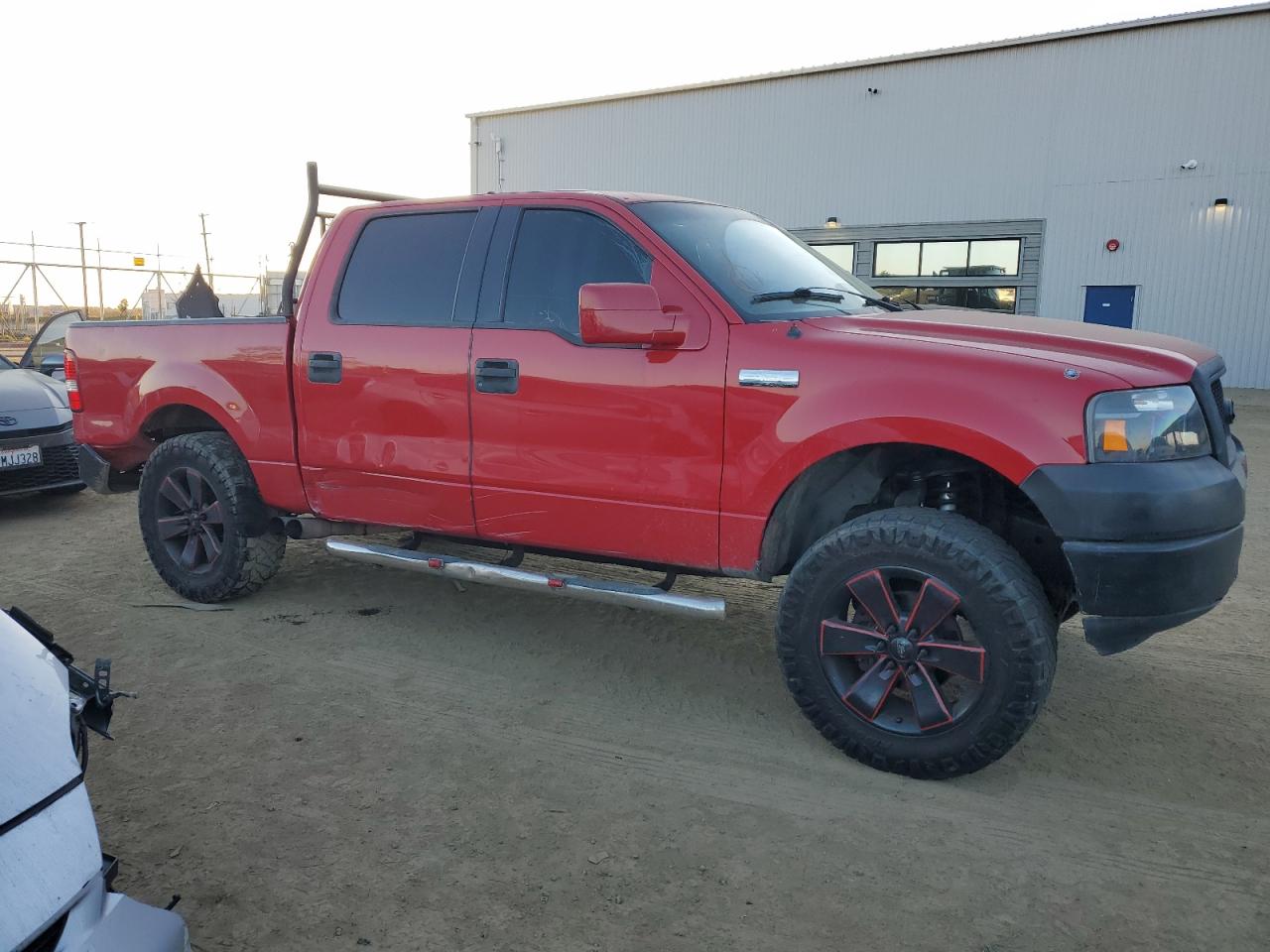 2005 Ford F-150 VIN 1FTPW12545KF02405 Copart auction photo, rear end / minor dent/scratches damage thumbnail 4