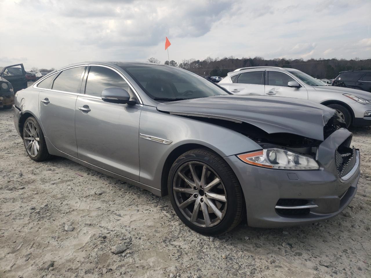 2012 Jaguar XJ VIN SAJWA1CB6CLV23313 Copart auction photo, rear end / front end damage thumbnail 4