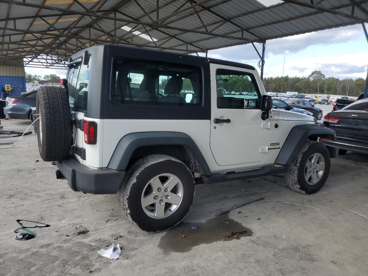 2012 Jeep Wrangler VIN 1C4AJWAG9CL210647 Copart auction photo, side / rear end damage thumbnail 3