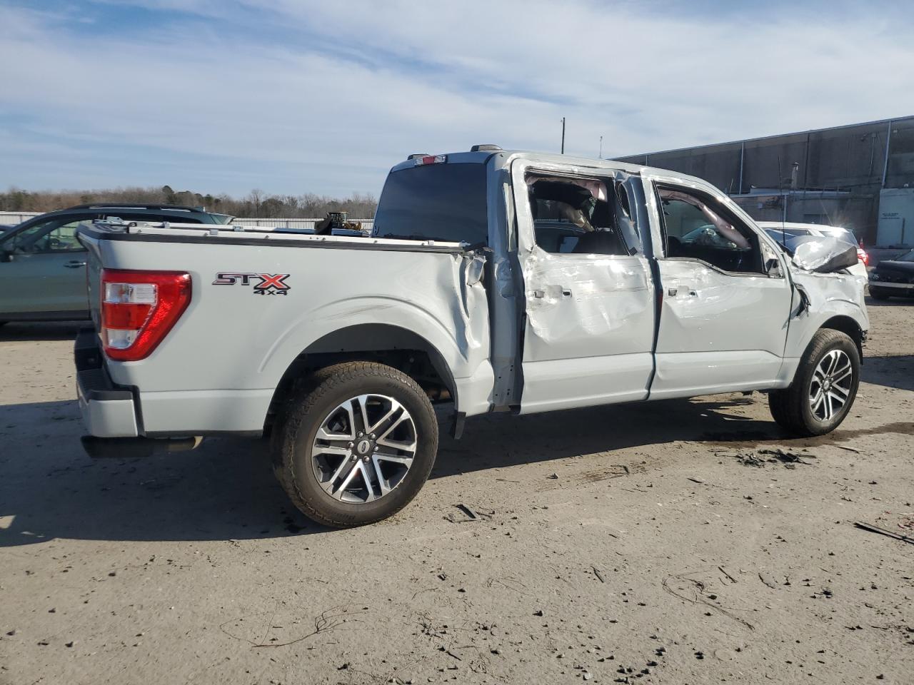 2023 Ford F-150 VIN 1FTFW1E53PFA46190 Copart auction photo, front end / side damage thumbnail 3